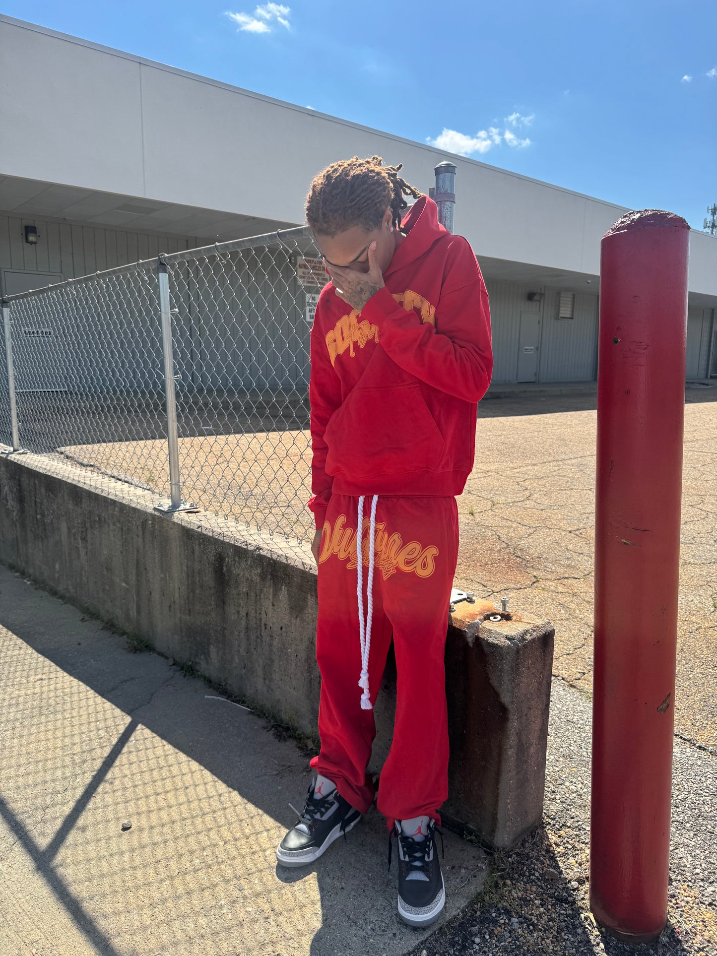 “red” middle man pants